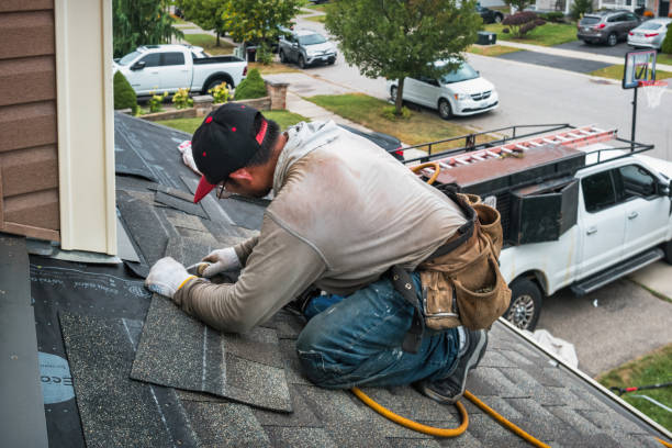 Professional Roofing technician working in York, ME